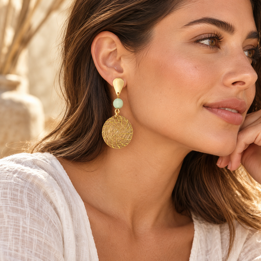 HELINN Verde Sol Woven Drop Earrings worn with white linen