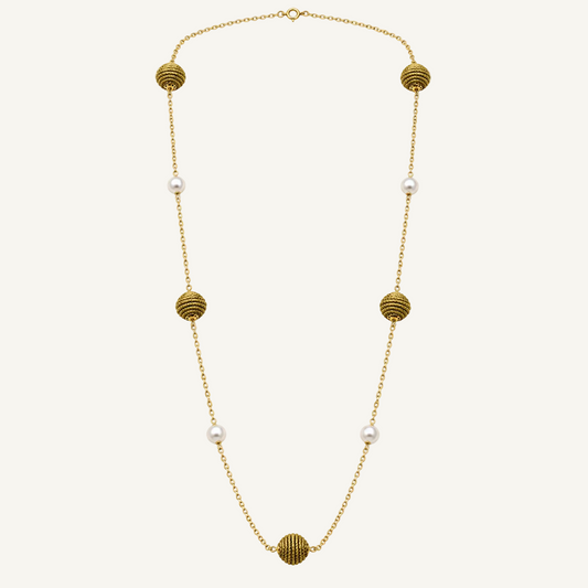 A gold chain necklace featuring five textured gold spherical beads and five small white pearls spaced along the chain, displayed on a clean white background.