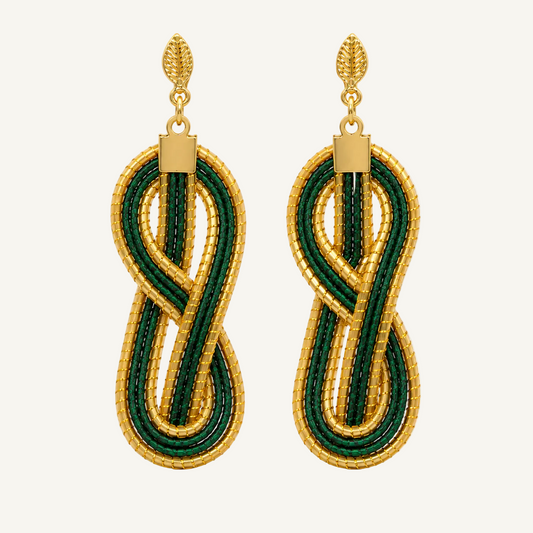 A pair of gold and green drop earrings with an infinity symbol design, shown on a plain white background.