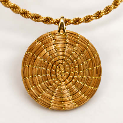 Close-up of Vida Sol Nascente handcrafted Golden Grass round woven pendant