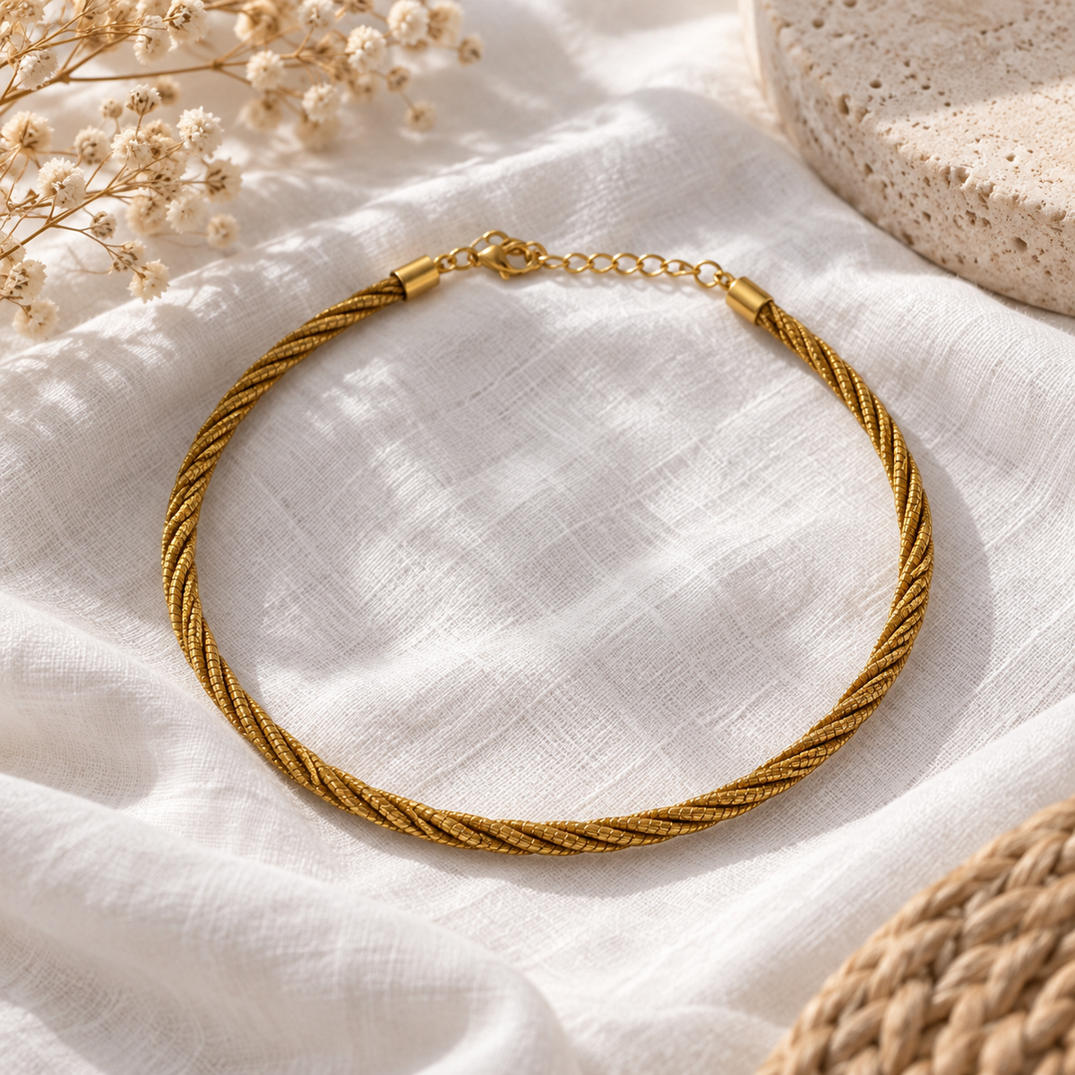 Vida Trança Dourada Golden Grass necklace styled on linen